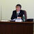 経営改善について話す三角理事長