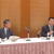 講演するエネ庁の山本課長（左は土川中部支部長）」