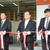 テープカットする右から根本社長、根本会長、松井支店長