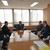 西郷村役場で石油の優位性などを紹介する根本理事長（中央）、畑常務理事（左）