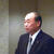 あいさつをする薩田理事長