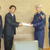 高田副市長（右中央）に震災復興資金の目録を手渡す宇佐美社長