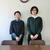 「組合員は平等」の言葉とともに雲崎さん㊨にバトンを渡す桜井さん