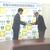 協定書を取り交わす坂井副理事長（右）と山口知事