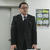 理事会であいさつする佐藤理事長