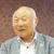 笑顔で退任のあいさつを述べた小岩井会長