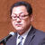 あいさつする佐藤支部長