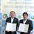 協定書を示す梅田町長㊧と杉江理事長