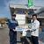 『満タン運動』のパネルを持つ河野県知事（左）と石商職員（防災展で）