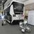 トヨタの燃料電池バスとホンダの給電器を組み合わせたムービングイーは被災地などでの使用を想定