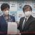総会で小池知事（左）と都税調報告を手交した