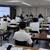 坂井信常務理事の講演風景